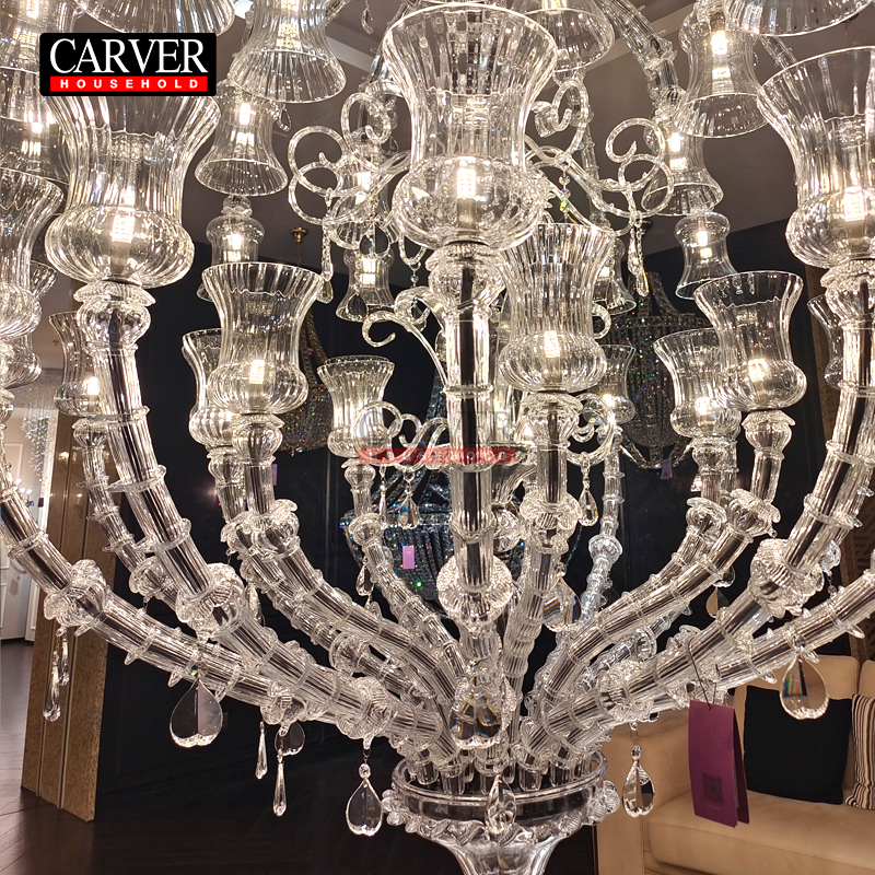 Luxurious Italian duplex with a hollow living room featuring a crystal chandelier, hotel showroom, hotel apartment, handmade Murano glass lighting fixtures - Image 2